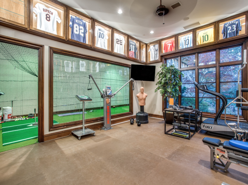 The fitness room and batting cage.