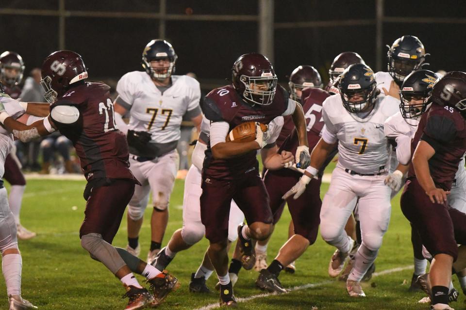 Trae Kater (10) runs the ball during Greencastle-Antrim's 42-26 win over Shippensburg on Friday, October 28, 2022