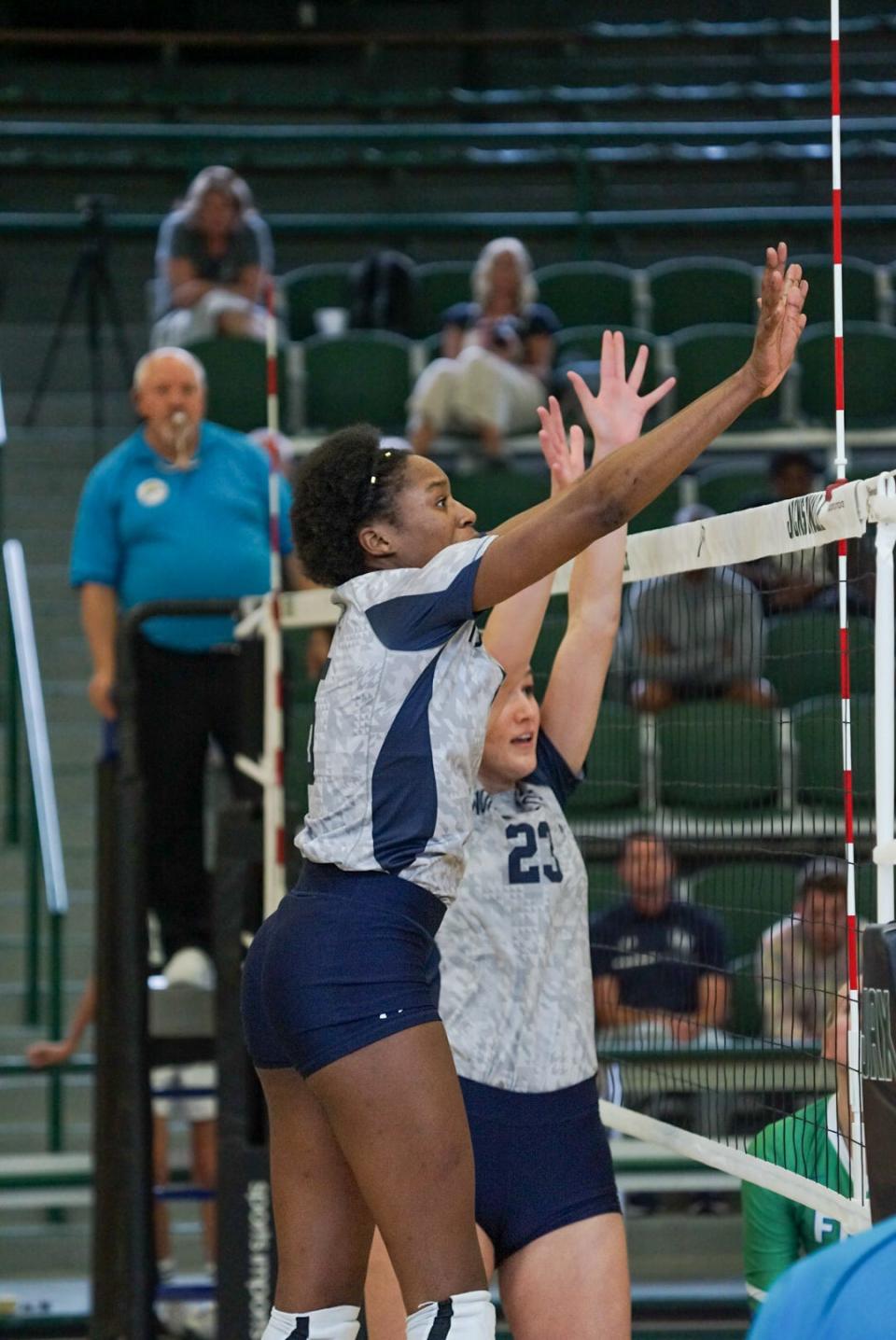 University of North Florida volleyball player Mahalia White (center) leads the Ospreys and is third in the ASUN in kills per set this season.