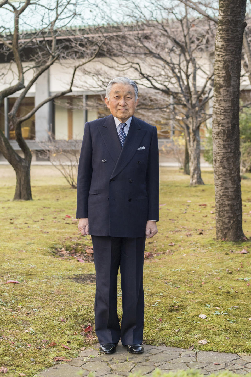 In this Monday, Dec. 10, 2018, photo released on Friday, Dec. 21, 2018, by the Imperial Household Agency of Japan, Japan's Emperor Akihito poses for a photograph at the garden of the Imperial Palace in Tokyo. Emperor Akihito, who turns 85 on Sunday, Dec. 23, and will abdicate this spring, says he feels relieved to see the era of his reign coming to an end without having seen his country at war. (The Imperial Household Agency of Japan via AP)