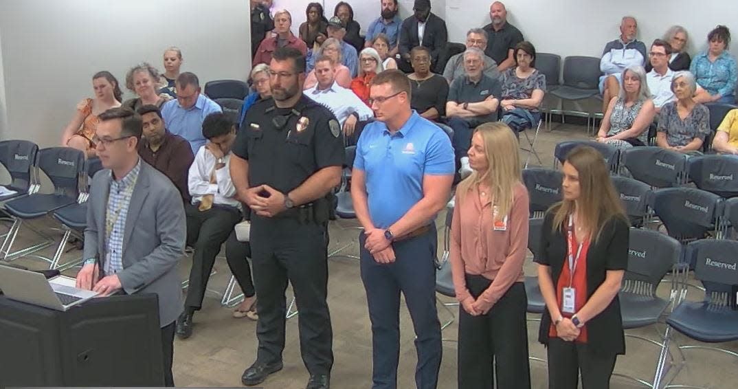 Stephen Hall, chief communications officer, applauded the quick action of seven employees including school police officer Justin Murray, principal Josh Grove, and nurses Lori Harmon and Kristin Rohrer.