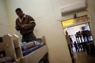 A migrant from Central America, sent back to Mexico to await his outcome of his case under the Migrant Protection Protocols (MPP), is pictured at El Buen Pastor shelter in Ciudad Juarez