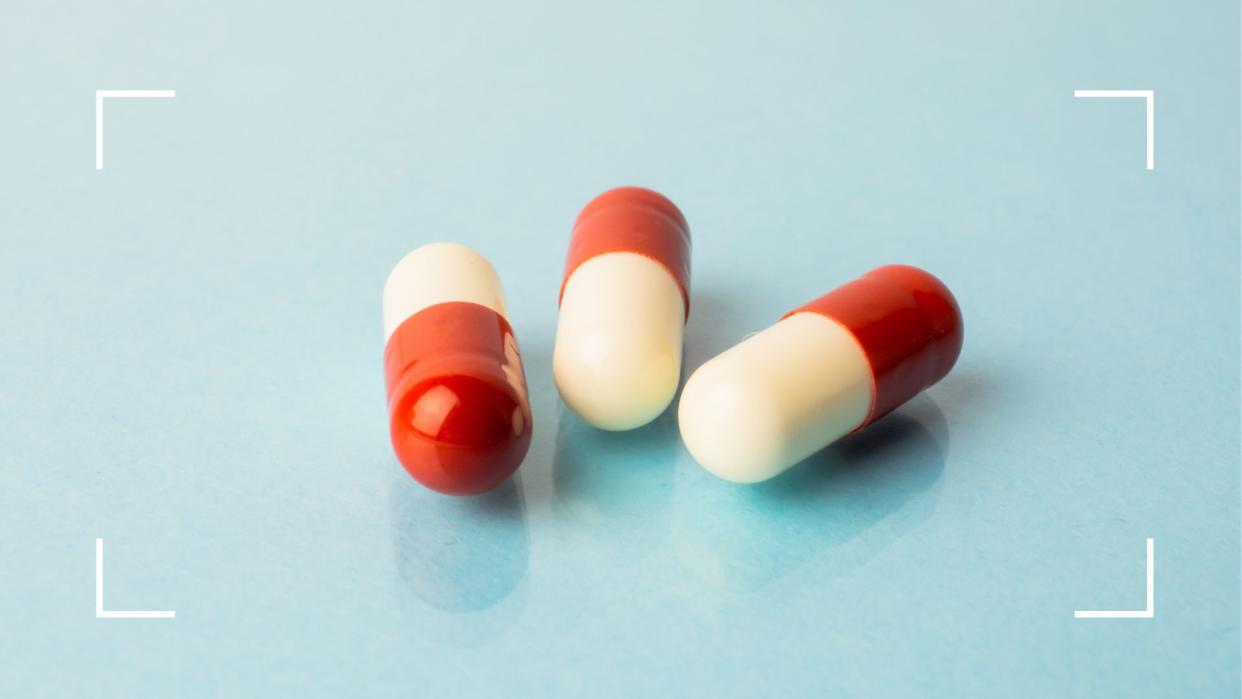  Three tablets sitting on a table, representing anastrozole, the new breast cancer drug. 