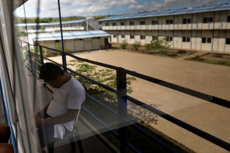 A drug rehab patient faces the wall at the Mega Drug Abuse Treatment and Rehabilitation Center, in Nueva Ecija province, north of Manila