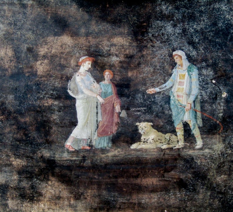 This image released by the Italian Culture Ministry on Wednesday, April 10, 2024, shows a fresco depicting the Greek mythology’s figures of Helen, left, and Paris of Troy, right, inside an imposing banquet hall, with elegant black walls, decorated with mythological subjects inspired by the Trojan War, recently unhearted in the Pompeii archaeological area near Naples in southern Italy. (Italian Culture Ministry via AP, HO)