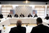 U.S. Secretary of State Mike Pompeo, center, attends a meeting with the Federation of Northern Greek Industries in the northern city of Thessaloniki, Greece, Monday, Sept. 28, 2020. Tension in the eastern Mediterranean is to feature prominently during Pompeo's two-day stay in Greece, which will include a visit to the Souda Bay naval base on the southern island of Crete Tuesday. (AP Photo/Giannis Papanikos, Pool)