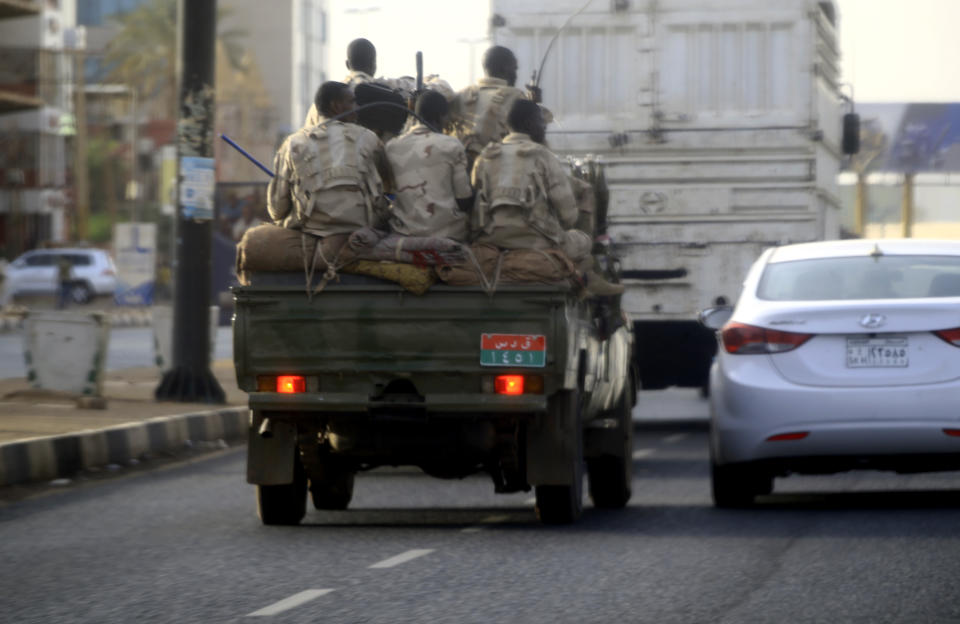 Sudanese security forces ride in the back of a pick up truck through a main avenue in Khartoum as the military continued to disperse protesters by force in Sudan's capital on June 4, 2019. - The Sudanese protest movement called the same day for fresh rallies and rejected the military rulers' election plan after more than 35 people were killed in what demonstrators called a "bloody massacre" by security forces. (Photo by - / AFP)        (Photo credit should read -/AFP/Getty Images)