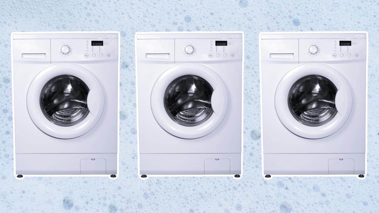  Three washing machines on soapy background. 