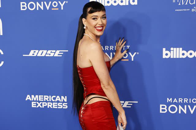 Katy Perry Flashes Her Thong and Backside in Lace-Up Skirt at