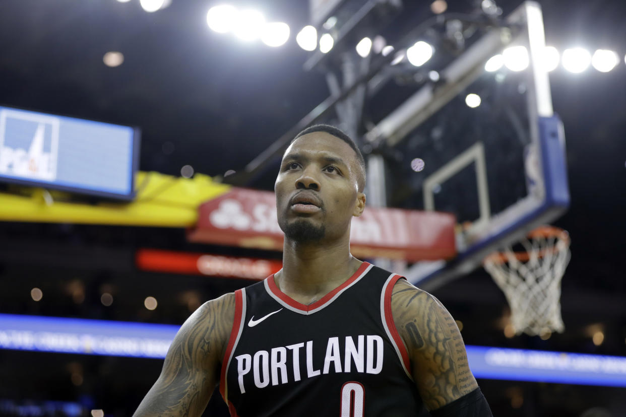 Damian Lillard gave up good food to improve his standing in the point guard hierarchy, but it was to no avail. (AP)