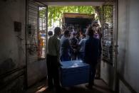 The Wider Image: The 1,700km journey to deliver coronavirus vaccine to India's rural health workers