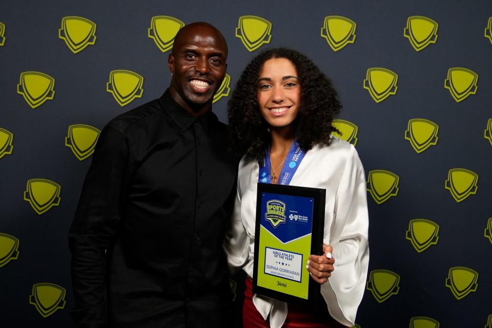 Former Patriot safety Devin McCourty with Sophia Gorriaran, of Moses Brown School.