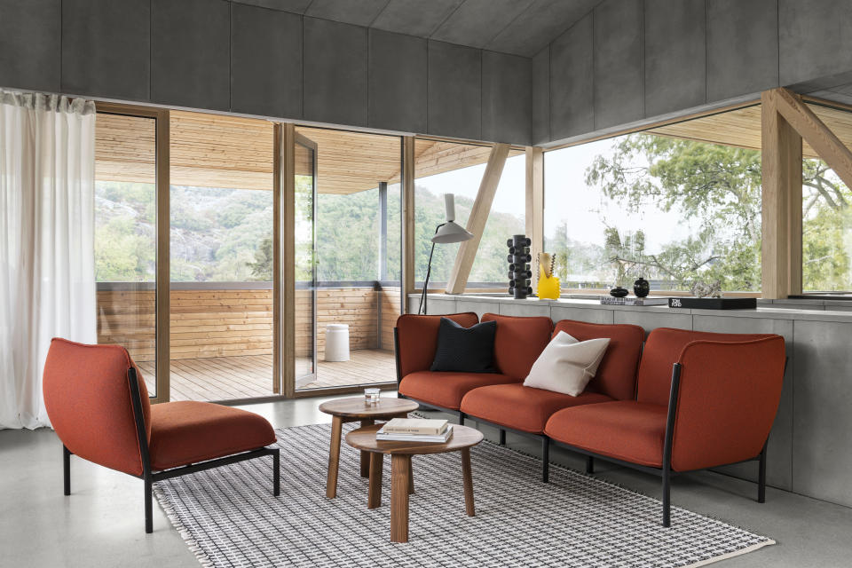 This undated photo shows Hem's Kumo modular sofa. On the furniture front in the terracotta palette, we're seeing trim, tailored pieces that are unquestionably modern. Hem's Kumo from Norwegian design team Anderssen & Voll is offered in a vibrant, fiery rust hued wool they call Canyon. (Erik Lefvander/Hem via AP)