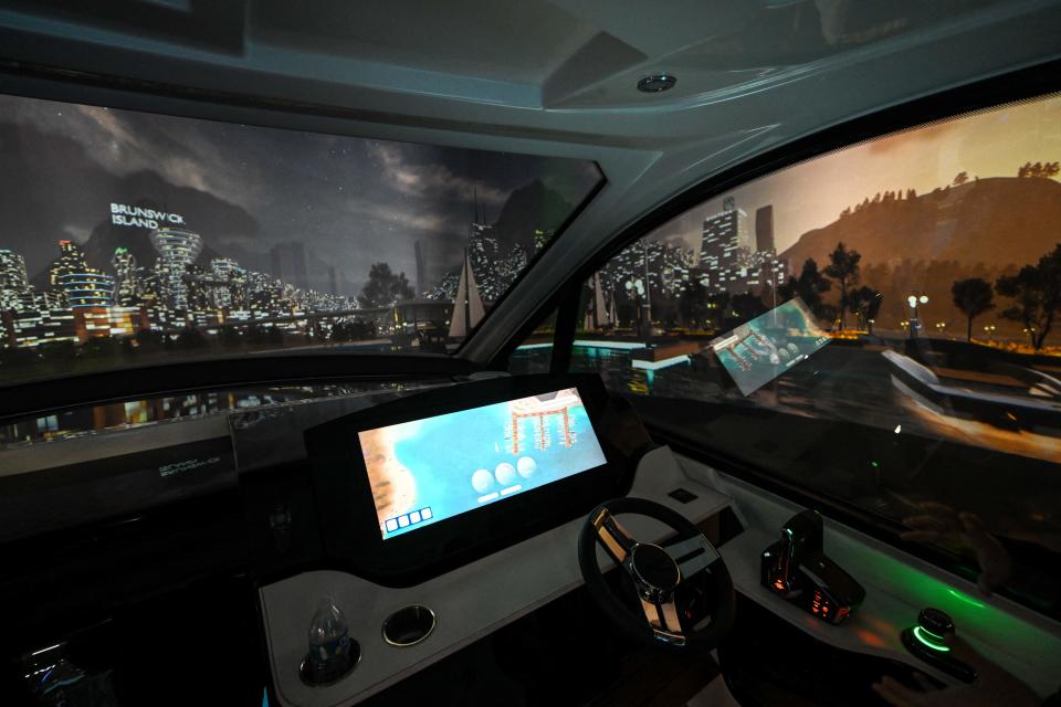Brunswick auto-docking technology with object detection is demonstrated in a boat helm simulator at the companys booth during the Consumer Electronics Show (CES) in Las Vegas, Nevada, on January 5, 2023. (Photo by Patrick T. Fallon / AFP) (Photo by PATRICK T. FALLON/AFP via Getty Images)