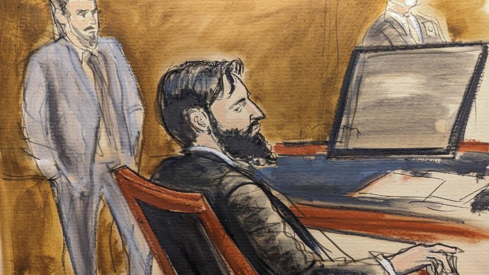 In this courtroom sketch, defendant Sayfullo Saipov listens during closing statements. as a US Marshal looks on from behind in Manhattan federal court, Tuesday, Jan. 24, 2023, in New York. (Elizabeth Williams via AP)