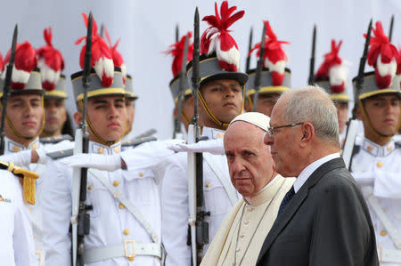 Pope Francis is greeted by Peru's President Pedro Pablo Kuczynski as he arrives in Lima, Peru, January 18, 2018. REUTERS/Alessandro Bianchi