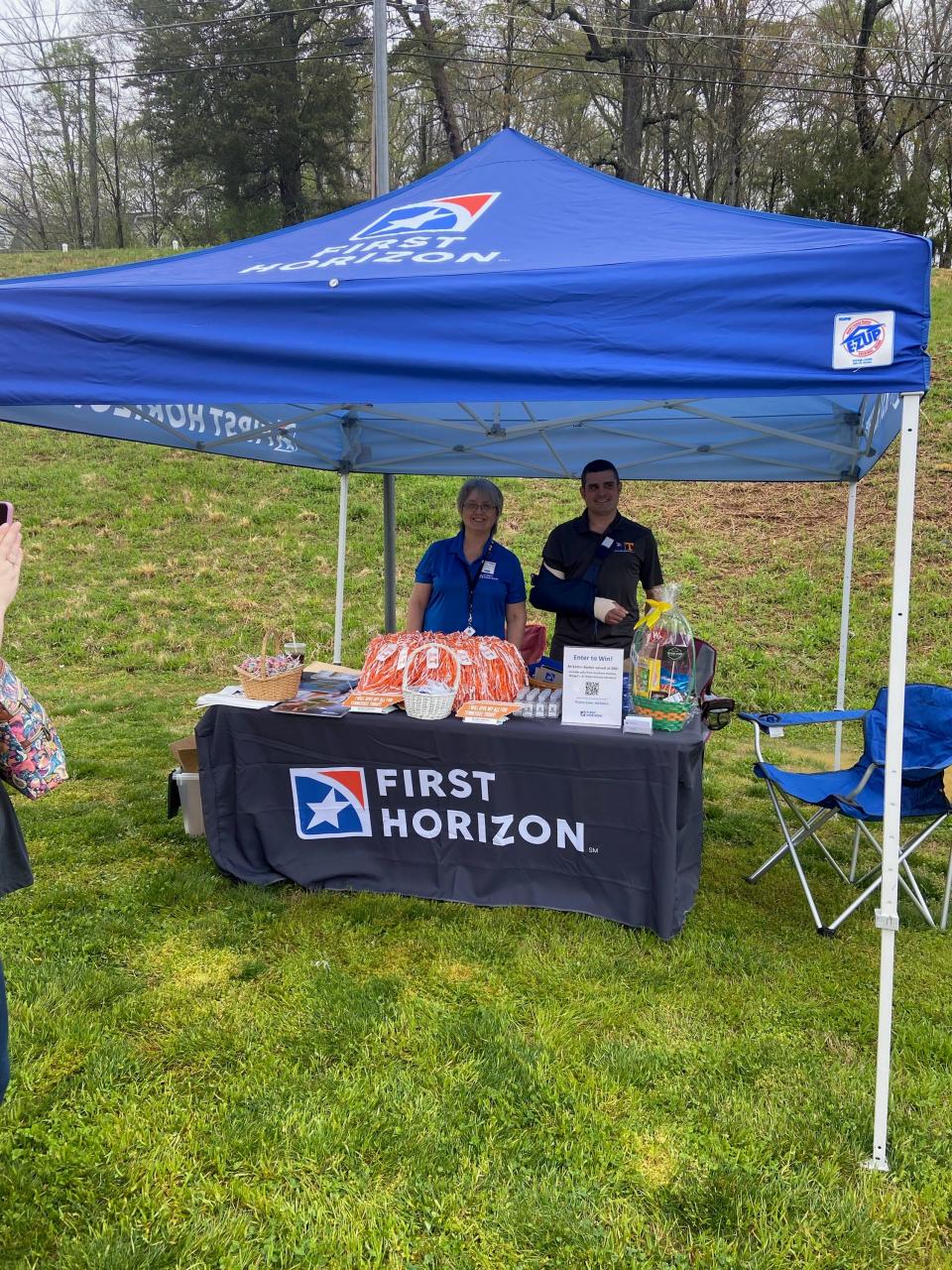 Maryann (left) and Adrian Allman represent First Horizon Bank at an Easter egg hunt in April 2022.