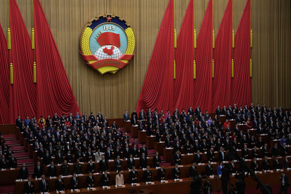 China's top leaders attend the opening session of the Chinese People's Political Consultative Conference in the Great Hall of the People in Beijing, Monday, March 4, 2024. (AP Photo/Ng Han Guan)