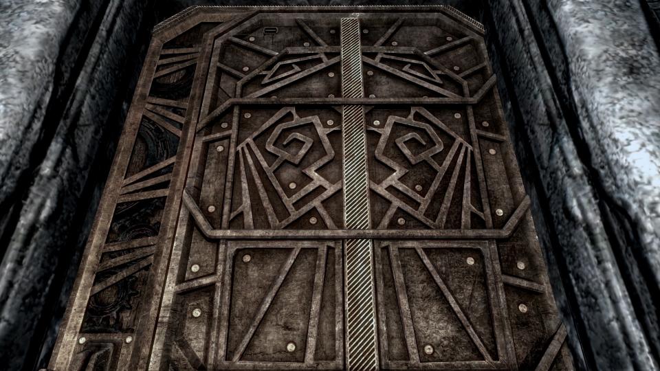 A detailed metal door from one of the best Skyrim mods, Glorious Doors of Skyrim