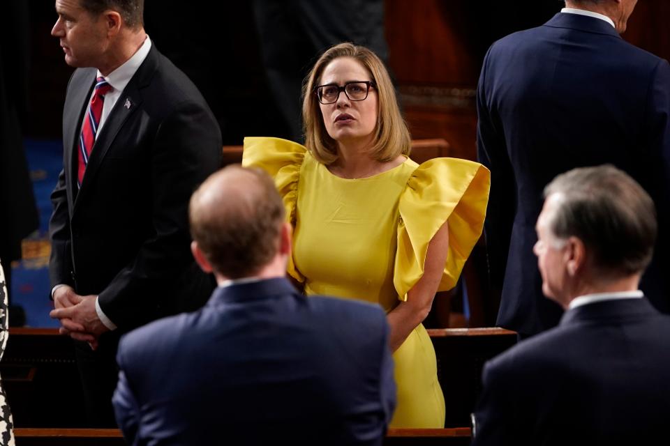 Kyrsten Sinema, I-Ariz., arrives before the State of the Union address from the House chamber of the United States Capitol in Washington.