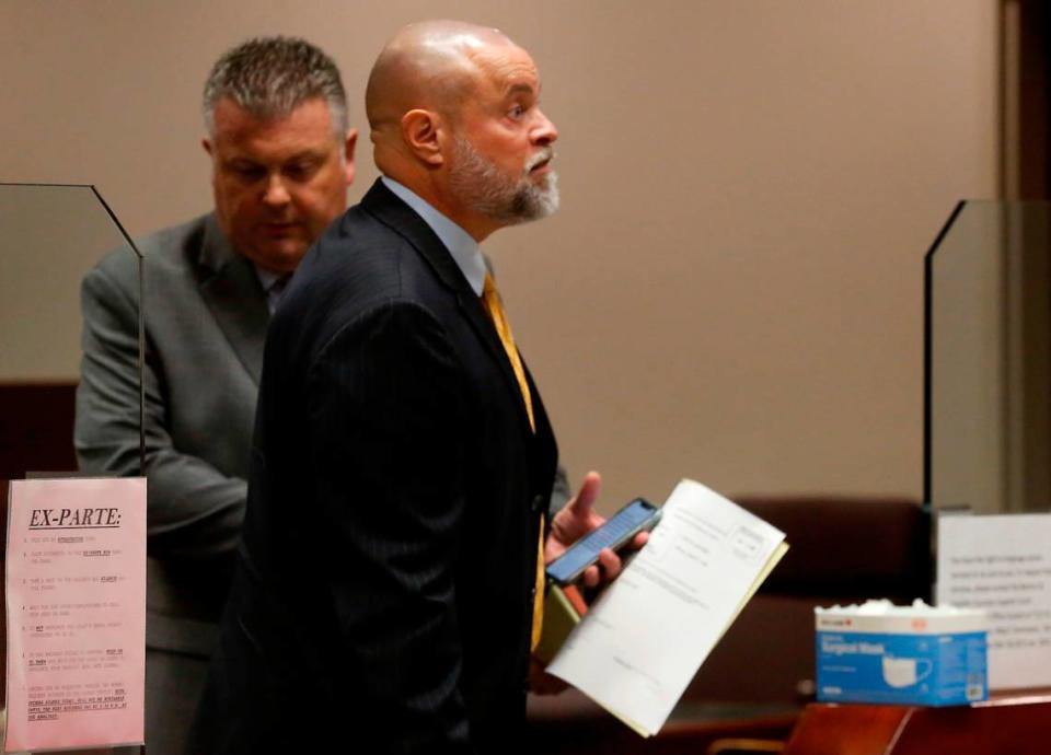 Judge Sam Swanberg, right, leaves a Franklin County courtroom with his defense attorney Scott Johnson after a jury acquitted him of domestic violence charges in 2022.