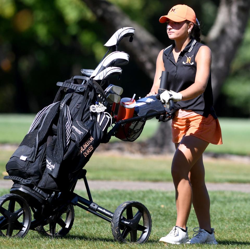 Marlington junior Zoe Mort plays the 11th hole during Girls Division I Sectional Golf at The Elms Country Club. Wednesday, Oct. 4, 2024