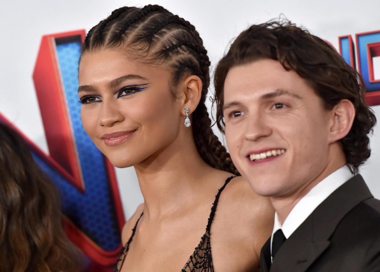 LOS ANGELES, CALIFORNIA - DECEMBER 13: Zendaya and Tom Holland attend Sony Pictures' 