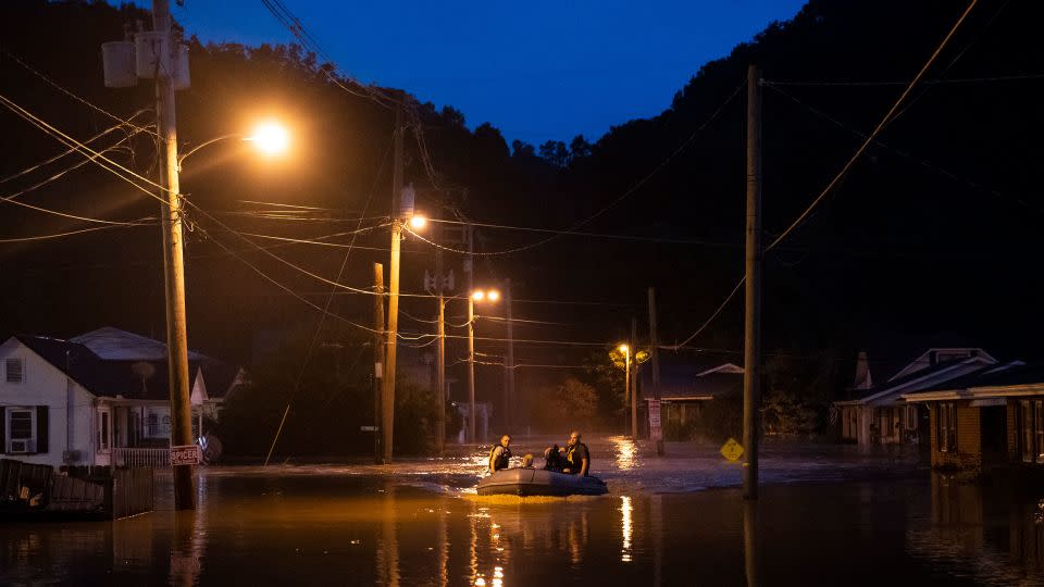 Members of the Jackson Fire Department prepare to conduct search and rescue operations downtown on July 28, 2022, in Jackson, Kentucky, after deadly flooding. - Michael Swensen/Getty Images