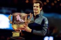 Tennis - China Open men's singles final - Beijing, China - 09/10/16. Britain's Andy Murray holds his trophy after defeating Bulgaria's Grigor Dimitrov. REUTERS/Thomas Peter