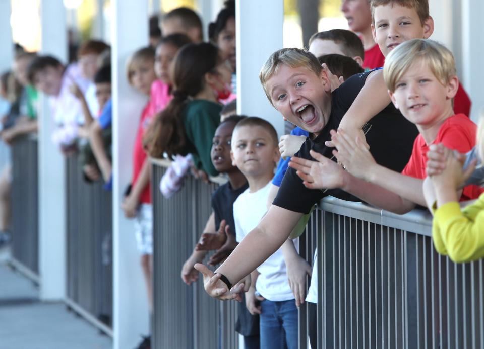 The Venice Indians get a send off from students at Venice Elementary School before the team leaves for Saturday's Class 8A state football final vs. Apopka in December. MATT HOUSTON/HERALD-TRIBUNE