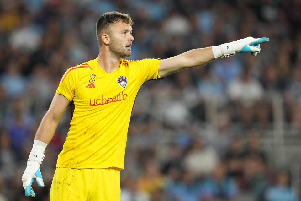 Colorado Rapids goalkeeper Marko Ilic directs teammates during the second half of an MLS soccer match against Minnesota United, Wednesday, Aug. 30, 2023, in St. Paul, Minn. (AP Photo/Abbie Parr)