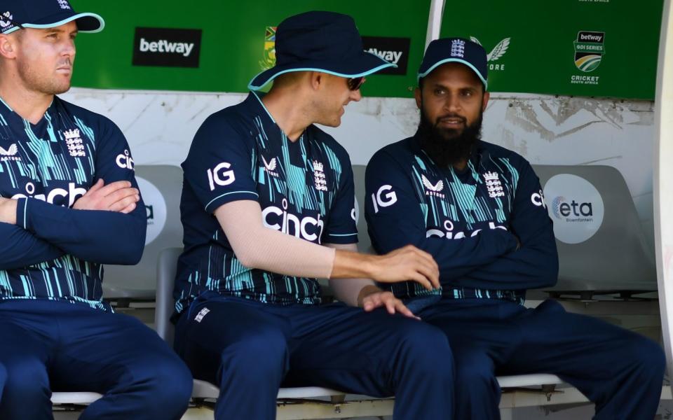 Adil Rashid sits in the England dug-out - Alex Davidson/Getty Images