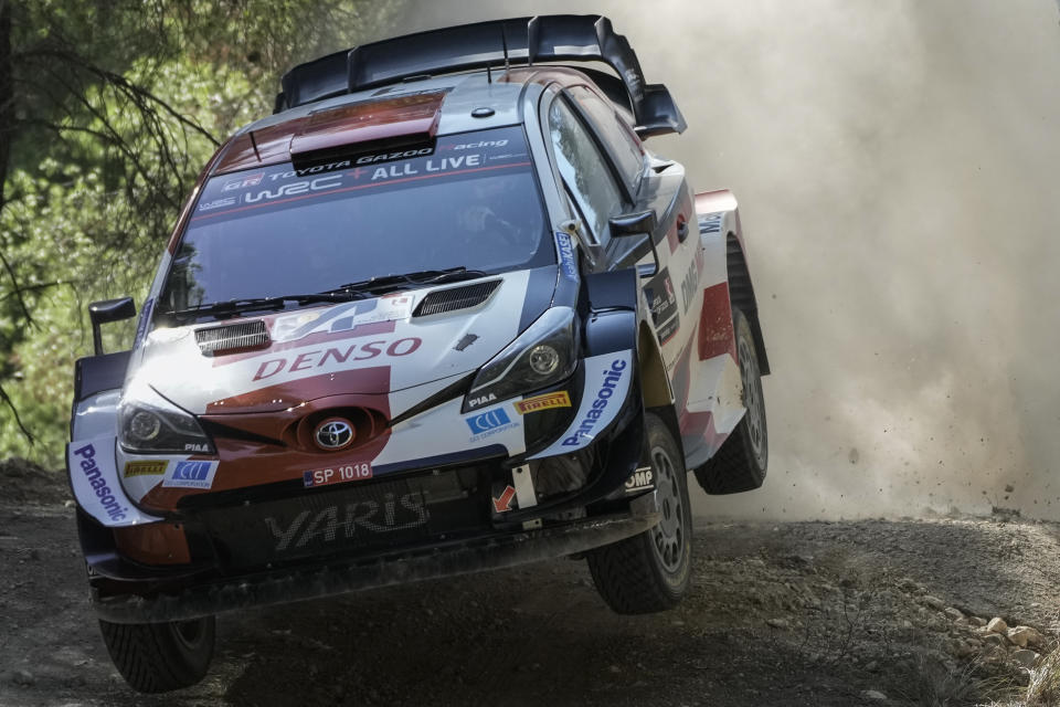 FILE - Sebastien Ogier of France steers his Toyota Yaris WRC car during the WRC Acropolis Rally at the stage of Aghii Theodori, west of Athens, on Sept. 10, 2021. The eight-time world rally champion Sébastien Ogier and his co-driver Vincent Landais have been hospitalised after beeing involved in a crash in Poland while preparing for this week’s World Rally Championship event there, Polish police and the Toyota team said Tuesday, June 25, 2024. (AP Photo/Petros Giannakouris)