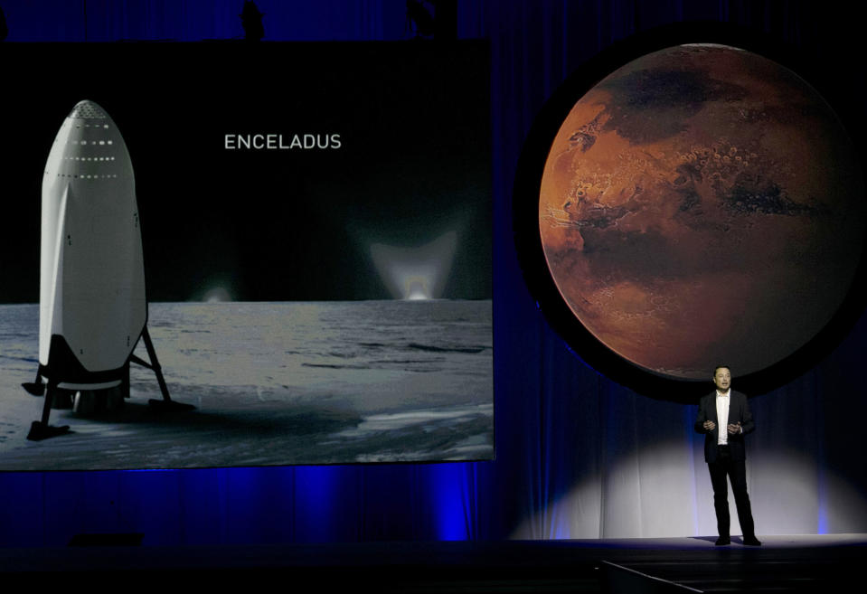 FILE - In this Tuesday, Sept. 27, 2016 file photo, SpaceX founder Elon Musk speaks during the 67th International Astronautical Congress in Guadalajara, Mexico. Starting with the dream of growing a rose on Mars, Musk’s vision morphed into a shake-up of the old space industry, and a fleet of new private rockets. In 2020, those rockets are scheduled to launch NASA astronauts from Florida to the International Space Station -- the first time a for-profit company will carry astronauts into the cosmos. (AP Photo/Refugio Ruiz)