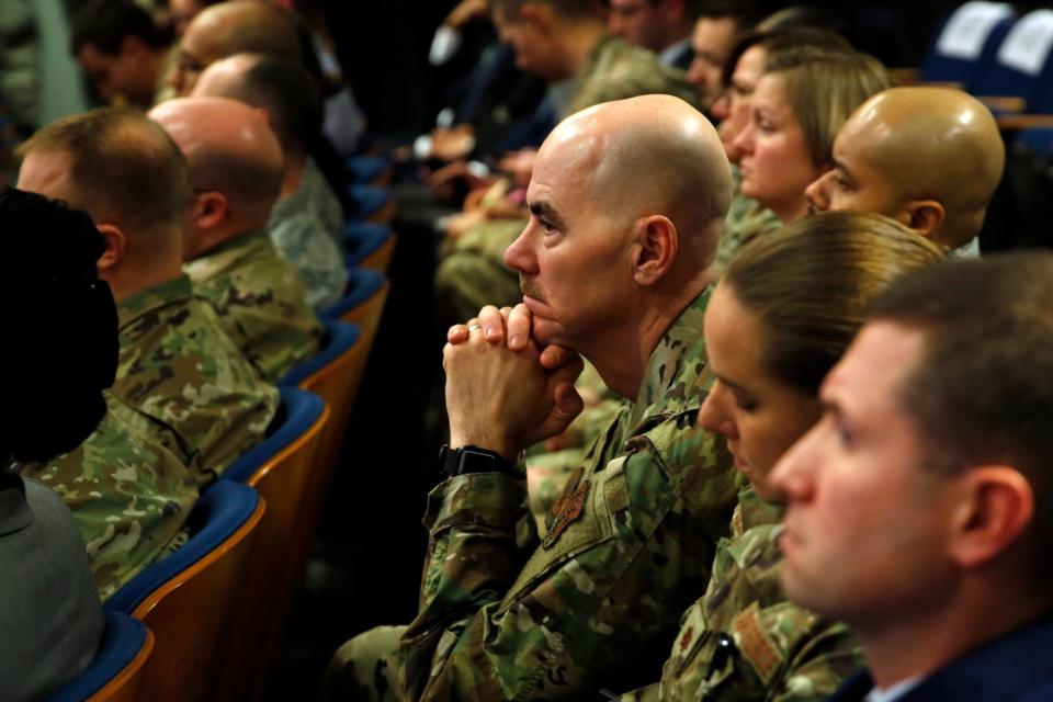 Military personnel listen to President Trump's pentagon speech (Getty Images)