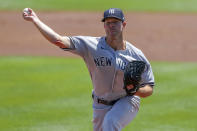 New York Yankees starting pitcher Corey Kluber throws against the Toronto Blue Jays during the first inning of a baseball game Wednesday, April 14, 2021, in Dunedin, Fla. (AP Photo/Mike Carlson)