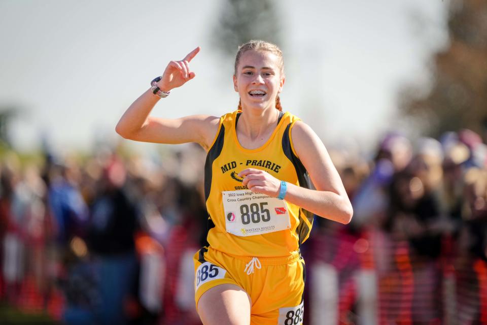 Danielle Hostetler of Mid-Prairie wins the Class 2A girls race at the state co-ed cross country meet in Fort Dodge, Friday, Oct. 28, 2022. It was Hostetler's third state title in as many tries.