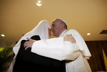 Pope Francis (R) and Patriarch Kirill, head of the Russian Orthodox Church, embrace in Havana, February 12, 2016. REUTERS/Max Rossi