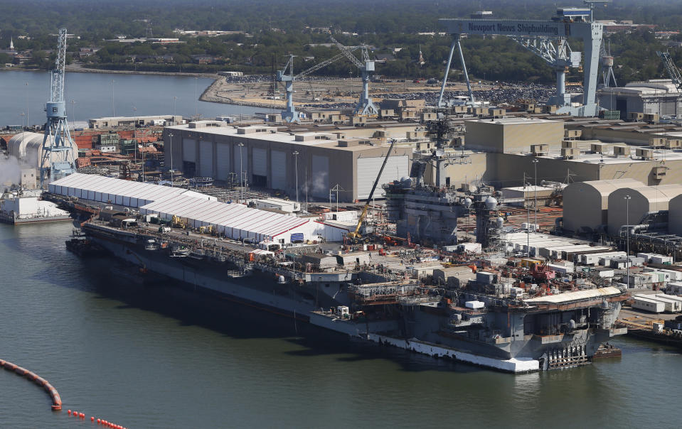 FILE - This April 27, 2016, file photo, shows the nuclear powered aircraft carrier USS Abraham Lincoln at Newport News Shipbuilding in Newport News, Va. The U.S. is dispatching the USS Abraham Lincoln and other military resources to the Middle East following “clear indications” that Iran and its proxy forces were preparing to possibly attack U.S. forces in the region, according to a defense official on May 5, 2019. (AP Photo/Steve Helber, File)