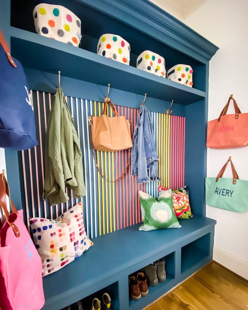 colorful diy slat wall in entryway