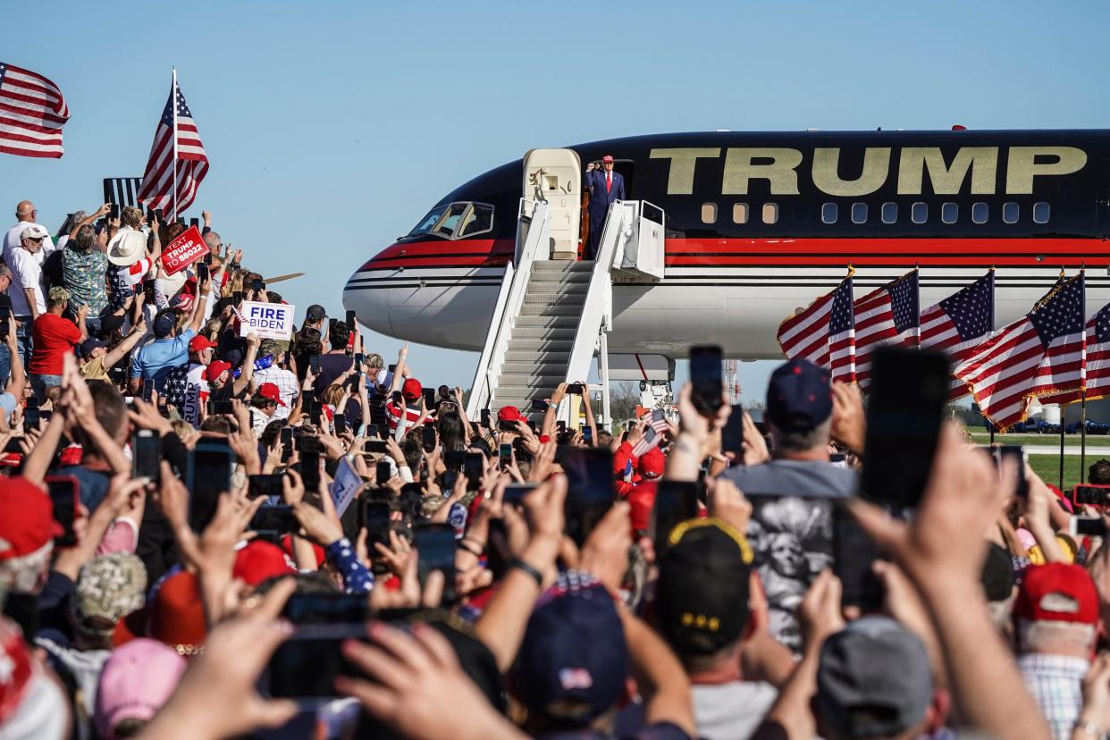 Former President Donald Trump exits his plane before speaking to a crowd of supporters during a rally at Avflight Saginaw in Freeland on Wednesday., May 1, 2024.