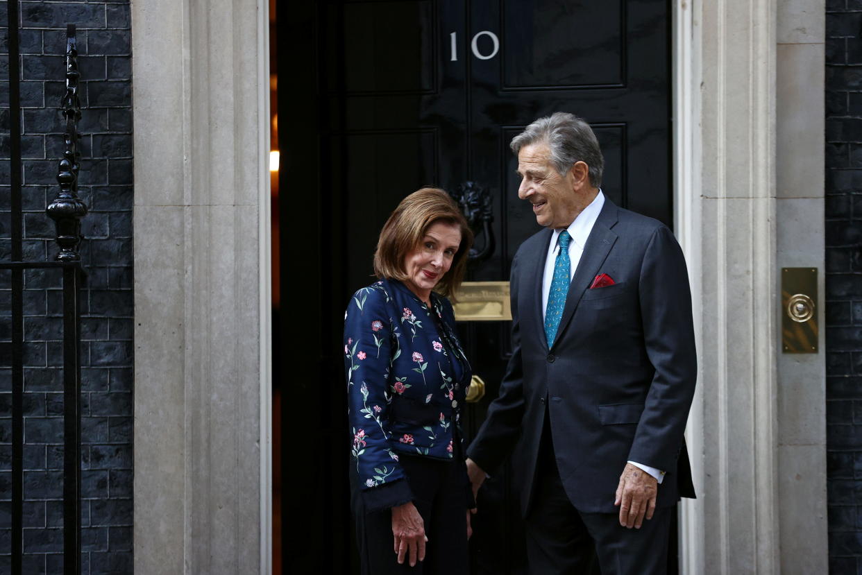 U.S. House Speaker Nancy Pelosi and her husband Paul Pelosi arrive on Downing Street, in London, Britain September 16, 2021. REUTERS/Hannah McKay