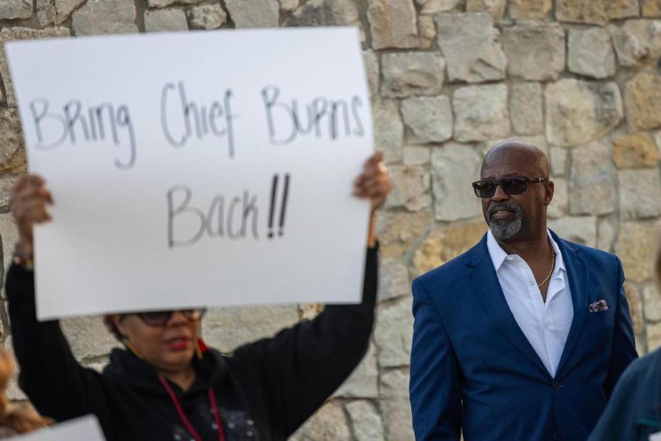 Former Forest Hill Police Chief Eddie Burns Sr., who was fired in February after being on medical leave for months before his termination, looks on at the dozens of residents rallying and holding signs in support of him in front of Forest Hill City Hall on Friday, March 1, 2024.