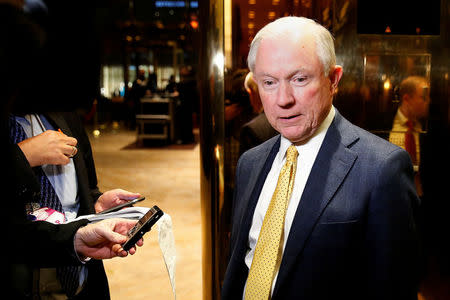 U.S. Senator Jeff Sessions (R-AL) arrives at the lobby of Republican President-elect Donald Trump's Trump Tower in New York, U.S., November 14, 2016. REUTERS/Carlo Allegri/File Photo