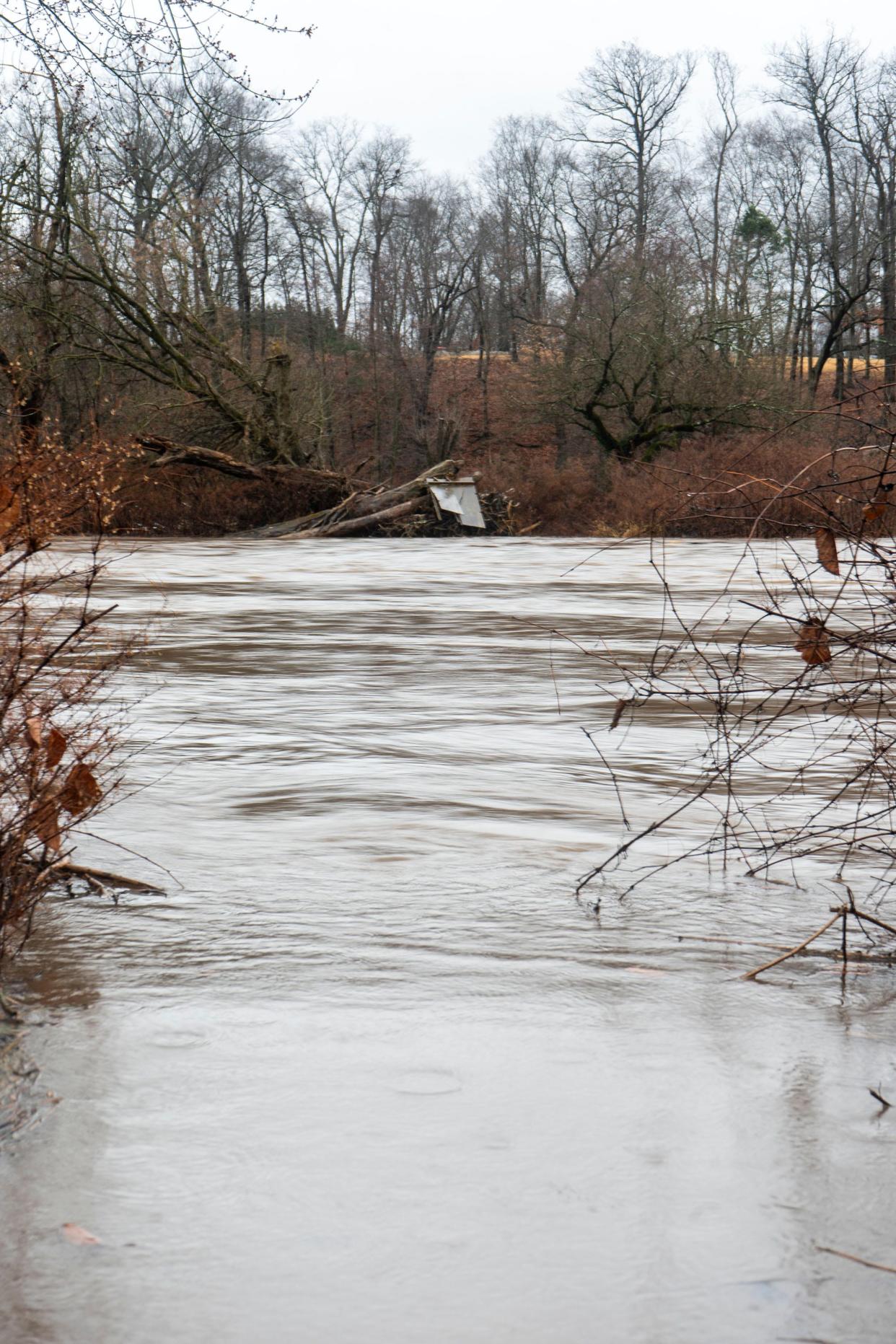 Neshaminy Creek overflows onto Water St. due to the most recent rain storm in Hulmeville on Monday, Dec. 18, 2023.

Daniella Heminghaus | Bucks County Courier Times