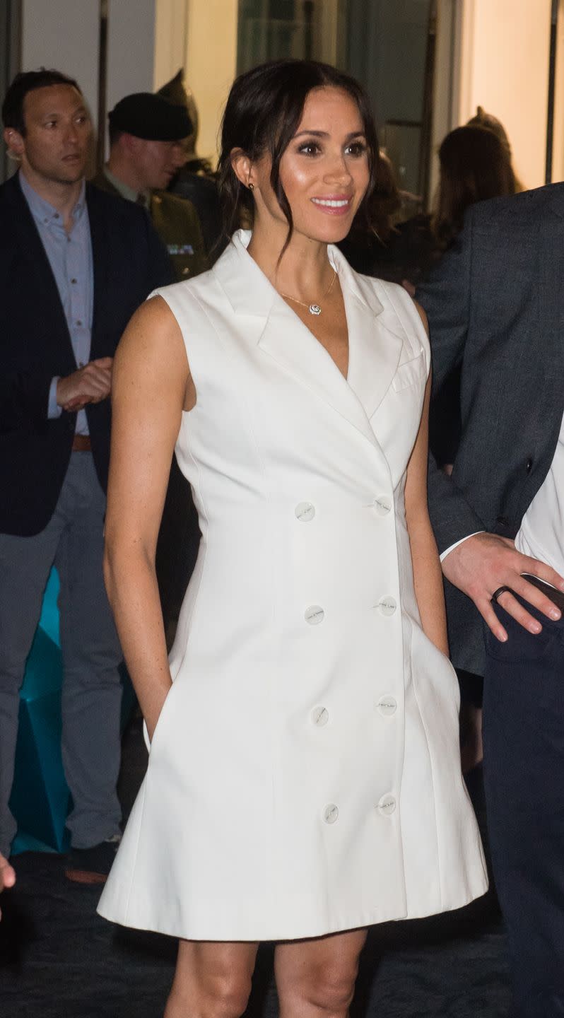 <p>During her royal tour of New Zealand in 2018, Meghan sported this blazer inspired white dress. </p>