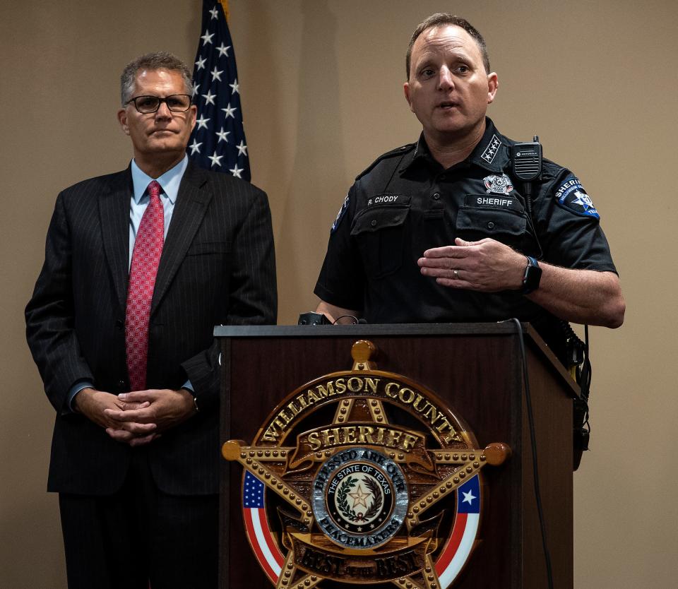 Williamson County Judge Bill Gravell, left, said former sheriff Robert Chody, right, failed to inform county officials of encounters between his officers and the public that could result in litigation, including Javier Ambler II’s death, leaving county officials blindsided by an unprecedented number of lawsuits and claims.