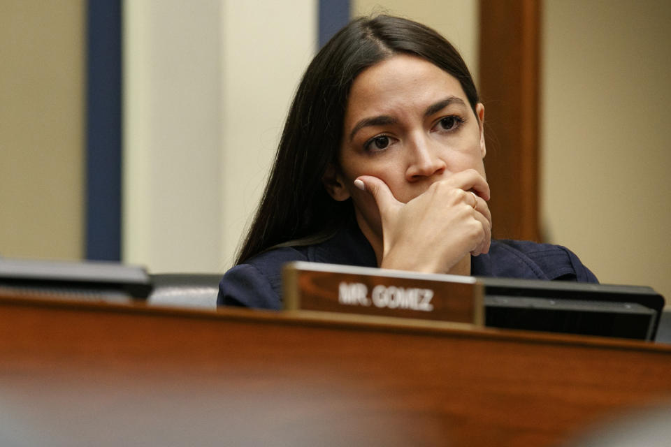 Rep. Alexandria Ocasio-Cortez, D-N.Y., listens to testimony by Yazmin Juárez, whose daughter Mariee, 1, died after being released from detention by U.S. Immigration and Customs Enforcement (ICE), during a House Oversight subcommittee hearing on Civil Rights and Civil Liberties to discuss treatment of immigrant children at the southern border, Wednesday, July 10, 2019, on Capitol Hill in Washington. (AP Photo/Jacquelyn Martin)