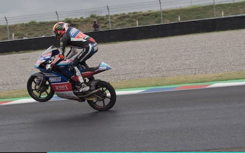 Marco Bezzecchi does a wheelie at the end of the Moto3 in Argentina  - Credit: Getty Images South America /Mirco Lazzari gp 