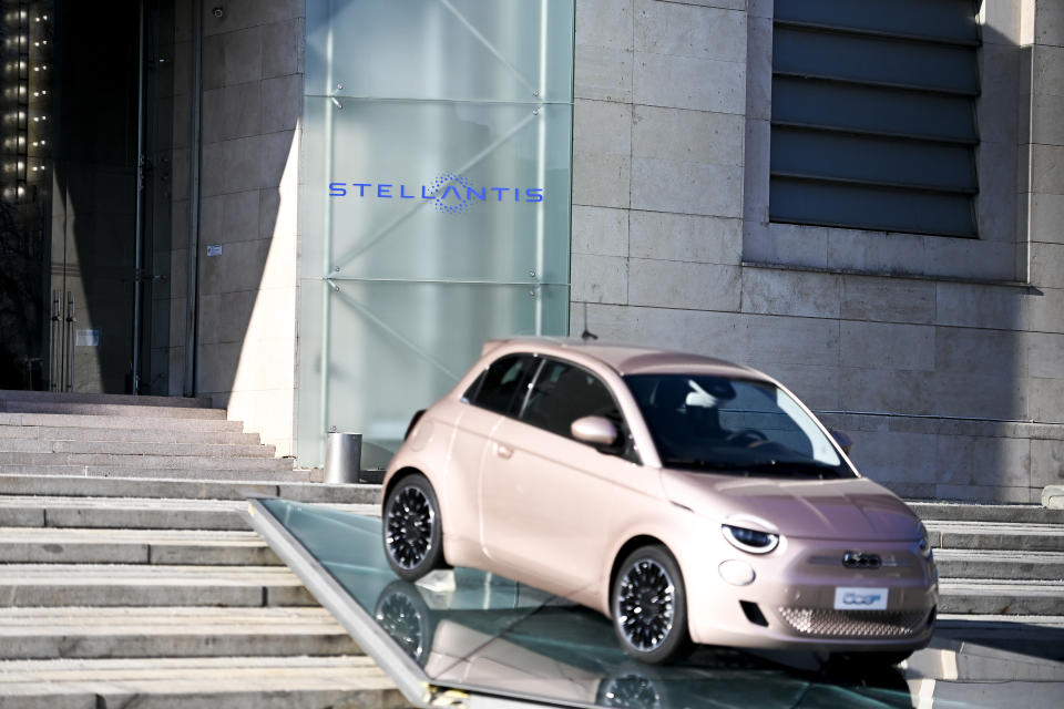 The new Stellantis logo was added on the side of the other logos of the group, on the day of the stock market debut, at the historic Mirafiori headquarters in Turin, Italy, Monday, Jan. 18, 2021. Stellantis, the car company combining PSA Peugeot and Fiat Chrysler, was launched Monday on the Milan and Paris stock exchanges, giving life to the fourth-largest car company in the world. (Marco Alpozzi/LaPresse via AP)